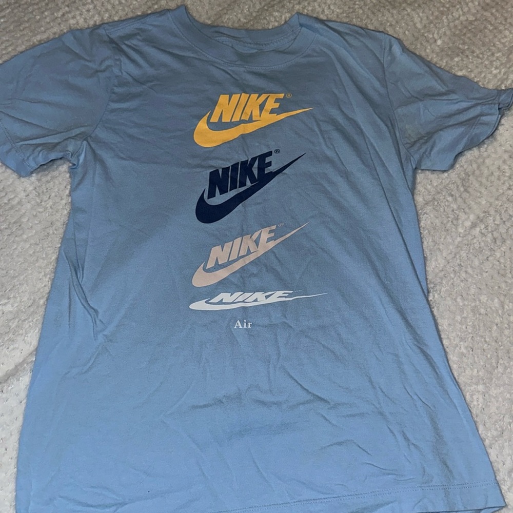 Big kids light blue Nike t shirt
